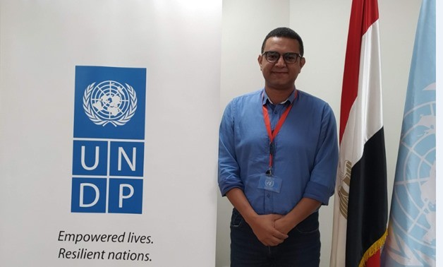 100 مصر.. علي عبده يحقق 3 أرقام قياسية ويروج لرؤية مصر 2030 فوق دراجته الكهربائية 100 مصر