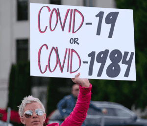 كيف يتعامل سكان الولايات المتحدة الأمريكية مع فيروس كورونا؟ بالمظاهرات الولايات المتحدة الأمريكية